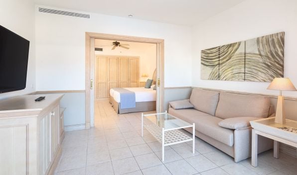 View of the bedroom from the living area in the 2-Bedroom Gold Level Senior Suite