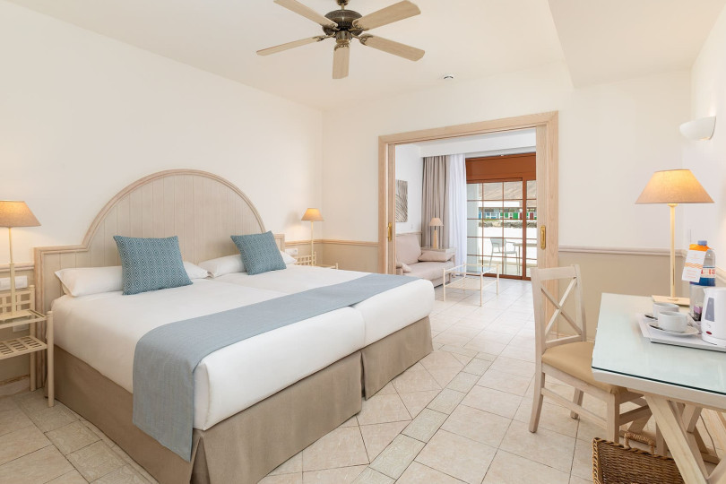 Master bedroom of the 2-Bedroom Gold Level Senior Suite at Hotel Gran Tagoro
