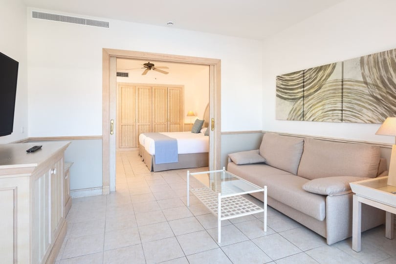 View of the bedroom from the living area in the 2-Bedroom Gold Level Senior Suite