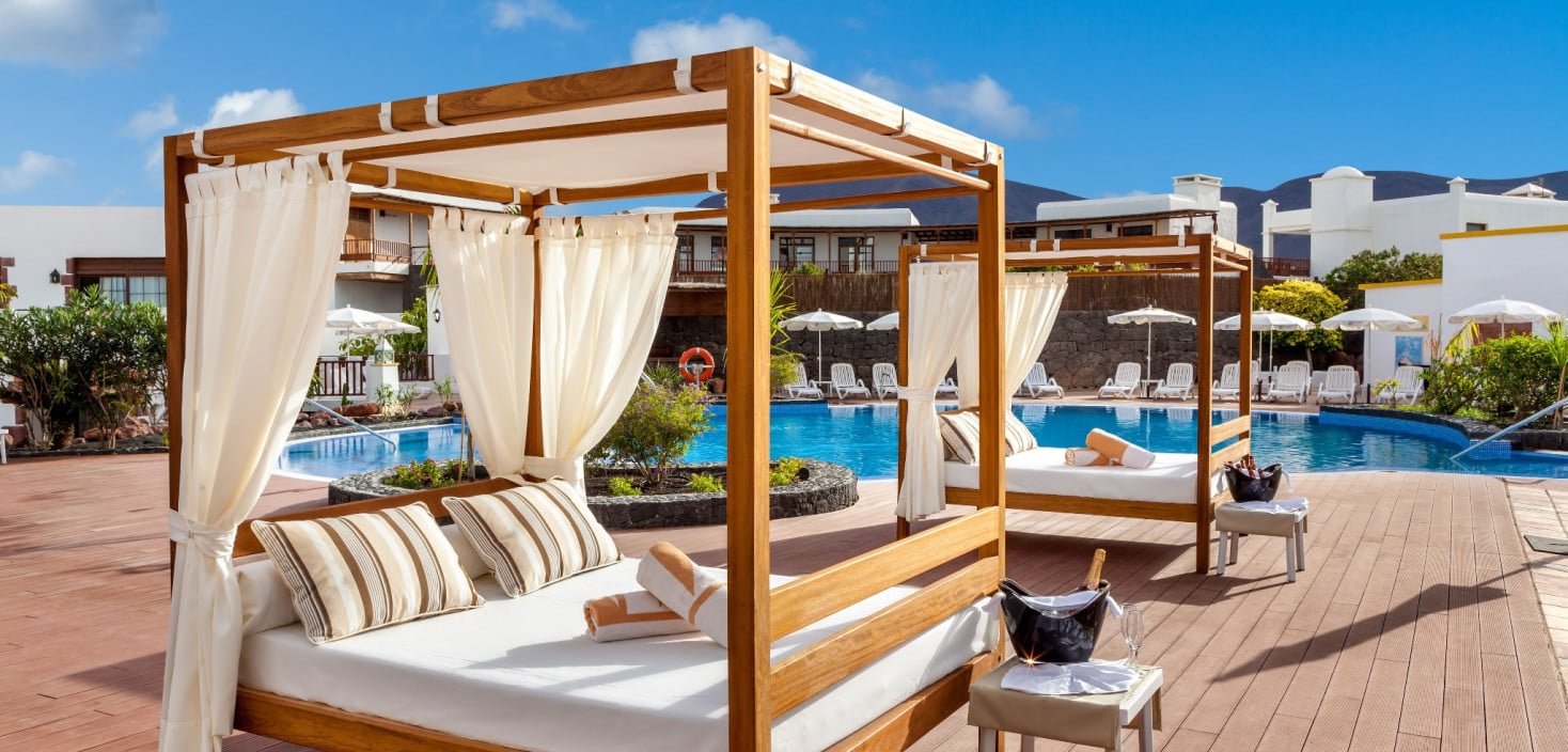 Balinese beds at the Gold Level Solarium in Hotel Gran Tagoro